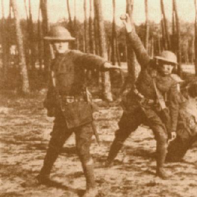 Photo of World War I soldiers throwing hand grenades.